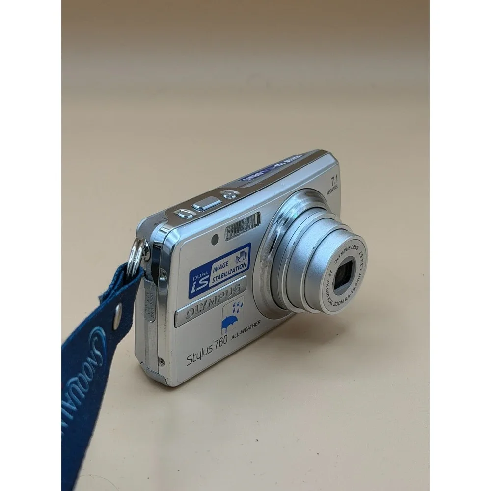 Olympus Stylus 760 7.1MP Digital Camera Silver Tested w/ Charger 1GB xD